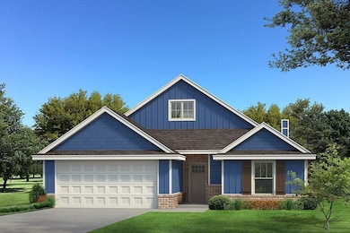 View of front facade featuring driveway, a front y