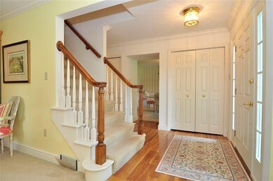 The Foyer welcomes guests with engineered hardwood
