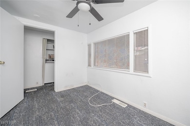 Spare room featuring carpet floors, washer / dryer