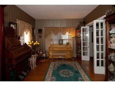 Living Room. Gorgeous Hardwood floors.  Owner curr