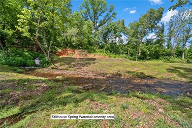 Stillhouse waterfall and creek in amenity area.