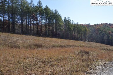 Partially wooded and cleared.