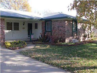 covered front porch, front yard landscaping