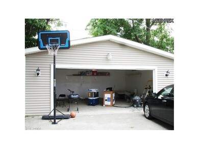 Oversized 2 car garage with new flooring, garage d
