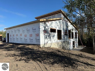 9890 Cushman Ct unit 4, Williamsburg, MI 49690 - photo 6