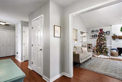 Interior space with lofted ceiling, dark wood-type