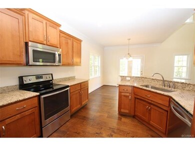 Custom cabinets, granite countertops, stainless st