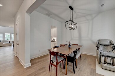 Dining area with recessed lighting, an inviting ch