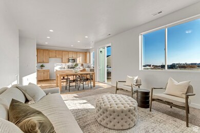 PHOTOS OF A SIMILAR HOME. COLORS, OPTIONS, AND FEATURES WILL VARY. Living room with recessed lighting and baseboards