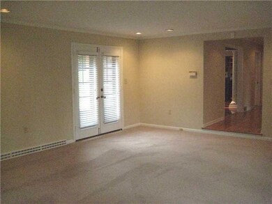 Living Room. Fresh decor and opens to rear patio m