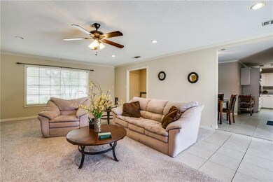 View of living area looking into dining and kitche