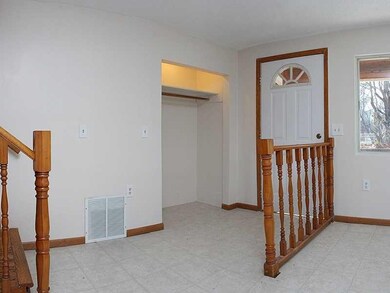 Entry. Tiled main level for ease of maintenance.