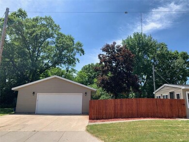 Fenced backyard to detached over-sized 2+car garag