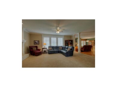 Spacious living room with a wall of windows