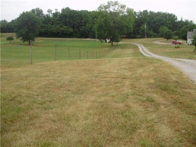 Grassy area is the right away to the 5 acres.