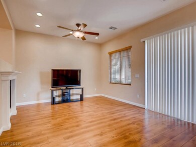 Family Room with Dual Fireplace and ROLLADEN SHUTT