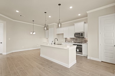 Island kitchen and dining area