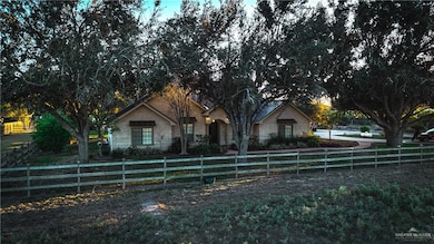 View of front of home featuring a fenced front yard