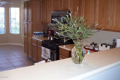 Kitchen opens to great room to right