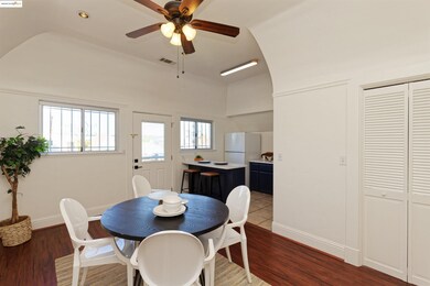 Dining area featuring wood finished floors, a ceiling fan, and recessed lighting