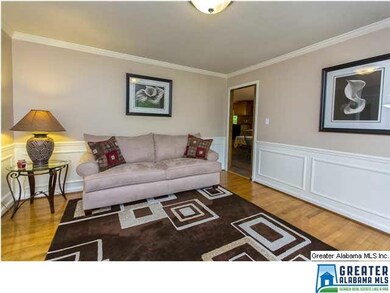 Dining room features wainscoting.