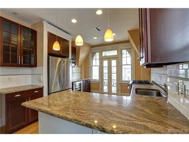 Kitchen leading to balcony