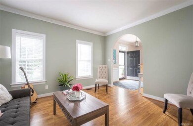 Bright and sunny entryway and living room.