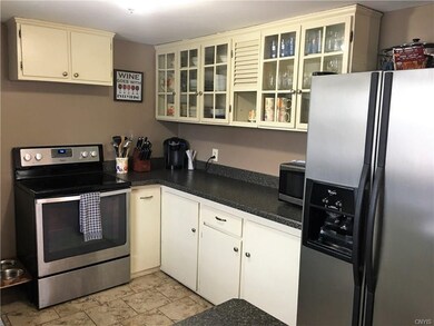 Updated kitchen with stainless appliances and tile