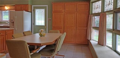 Another view of the eat-in kitchen. Large pantry f