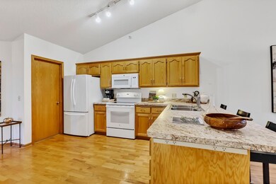 Large walk in pantry to left of refrigerator