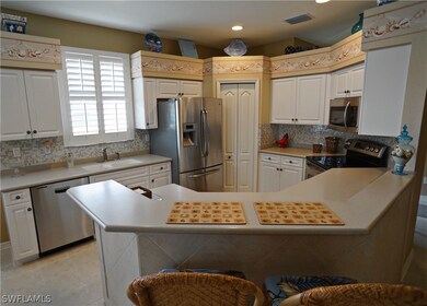 Kitchen w/Updated SS Appliances & Glass Tile Backs