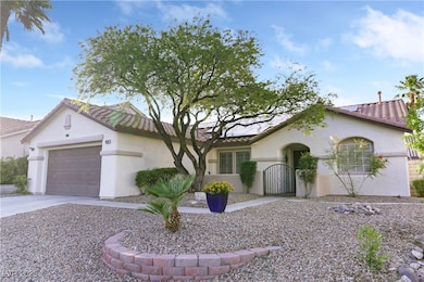 Mediterranean-style home with Spanish accents, fea