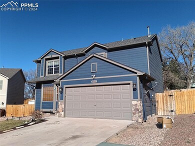 View of front of home with a garage