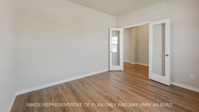 Unfurnished bedroom featuring light hardwood / woo