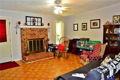 Bright living area w/ fireplace