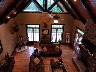 View of den from upstairs balcony.