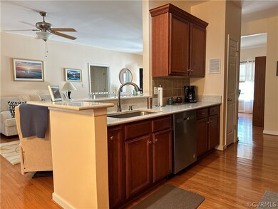 Kitchen with light hardwood / wood-style flooring,