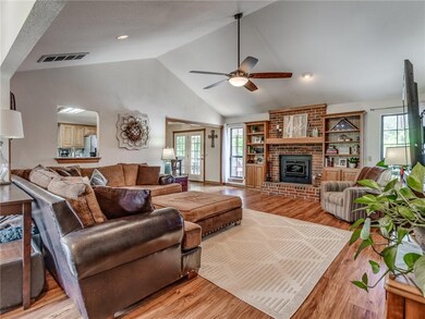 Living Room with vaulted ceiling and wood burning 