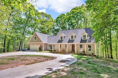 New england style home featuring a porch, a shingl