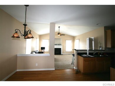 Kitchen, family room, and breakfast area open to e