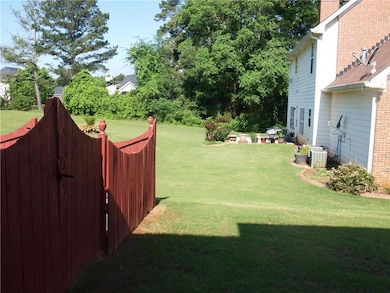 View of yard with cooling unit