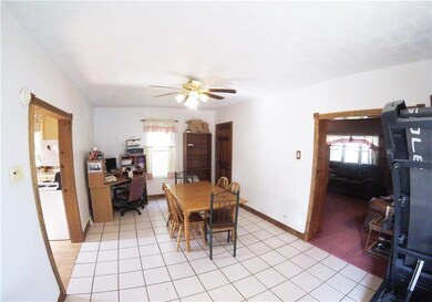 Ceramic tile flows through the dining room...