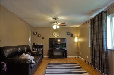 Spacious living room complimented with hardwood fl