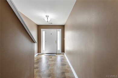 Entrance foyer featuring tile floors