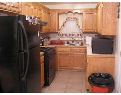 Kitchen. New cabinets & ceramic tile flooring.