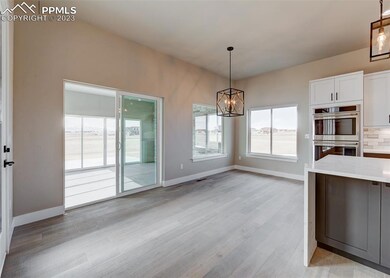 Dining space with walk out to outdoor living space