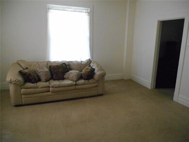 Spacious Living Room very neutral dcor.