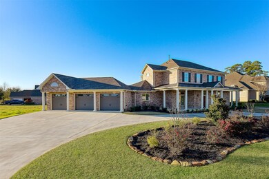 The large corner lot supports the large circular drive and the three car garage complete with workshop area.  The lot to left is also for sale if you want even more space.