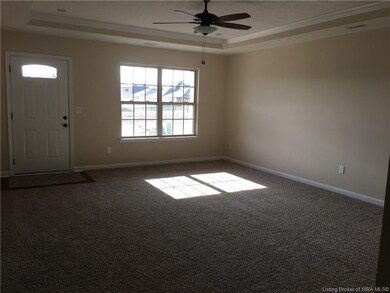 Large Great room with trey ceiling.