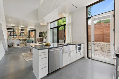 Kitchen featuring stainless steel appliances, fin